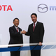 Toyota president Akio Toyoda and Mazda president Masamichi Kogai announce a $1.6-billion U.S. plant. Photo credit: AP Photo/Eugene Hoshiko